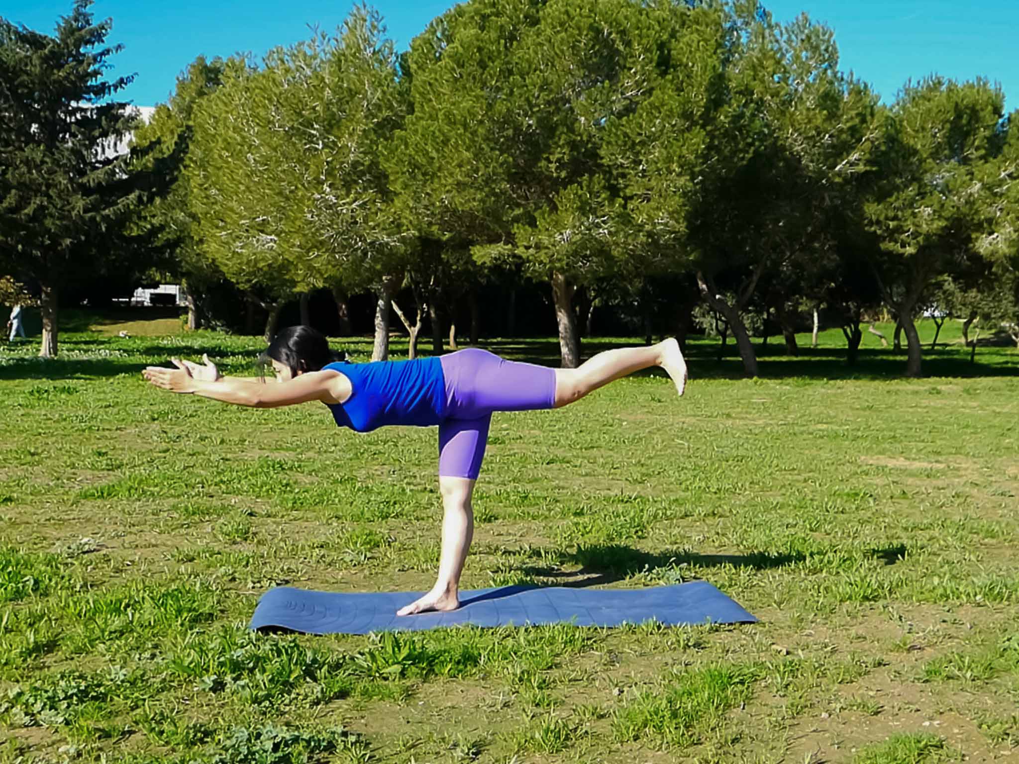 woman practicing Warrior Pose 3 (Virabhadrasa Ⅲ)